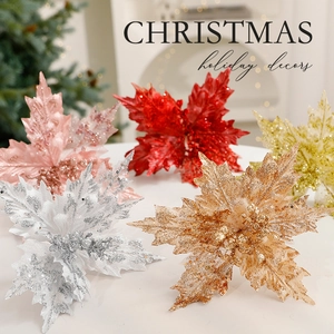 Sparkling artificial Christmas flowers in various colors for festive tree decoration