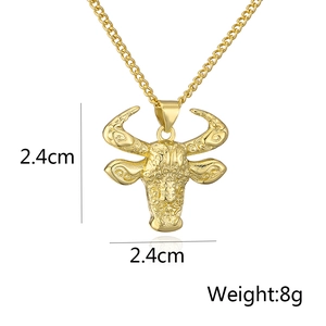 Detail view of 18K gold plated bull head pendant with dimensions 2.4cm and weight 8g