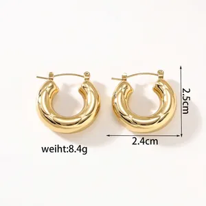 Detailed view of 18k gold plated hoop earrings with embossed diamond pattern and size info