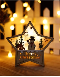 Lampe de Noël en bois en forme d'étoile avec bonhomme de neige et texte Merry Christmas