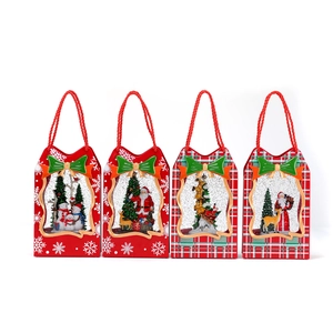 Set of 4 red Christmas gift bag water globes with Santa, snowman and reindeer scenes
