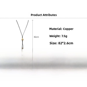 Detail showing an 82cm long necklace with a 2.6cm gold-tone copper cone pendant