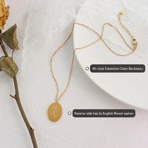 Golden titanium steel oval necklace with rose carving and 40cm plus 5cm extension chain