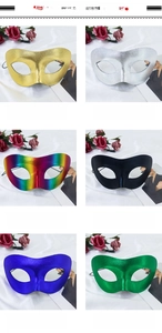 Six colors of metallic Zorro half-face masks for masquerade with ribbons on silk background
