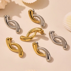Minimalist twisted teardrop stud earrings in gold and silver stainless steel set