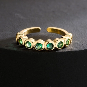 Fashion 18K gold-plated adjustable ring featuring five vibrant green zircon stones