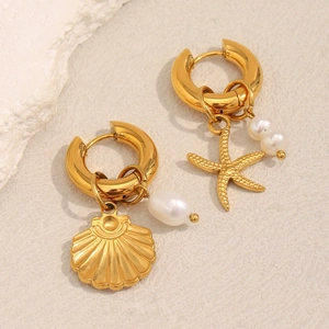 Detail view of 18K gold plated starfish and pearl pendants on elegant hoop earrings