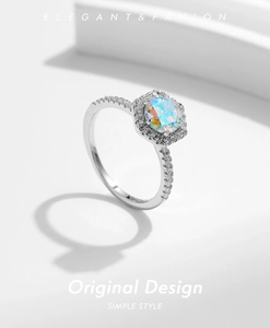 Macro shot of s925 sterling silver ring with colorful gradient cubic zirconia stones