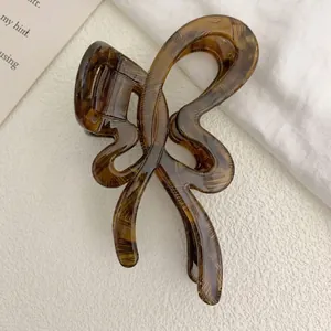 Fairy style butterfly cellulose acetate hair claw clip with dark amber tortoise pattern