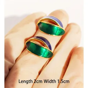Vintage geometric enamel stud earrings with green and purple color block in gold plating