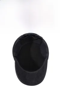 Detail view of winter hat with thick warm inner lining and ear flaps for cold protection