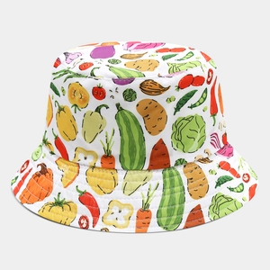 Detail of white cotton bucket hat with colorful hand-drawn vegetable pattern prints