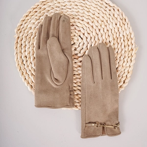 Detail of khaki suede gloves featuring elegant gold horsebit buckle and warm fleece lining