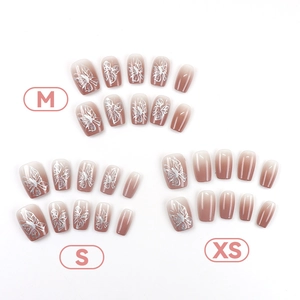 Brown gradient press-on nails with silver butterfly patterns in M, S, and XS sizes