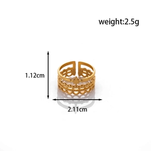 Adjustable gold stainless steel ring with hollow star design and sun cross motifs