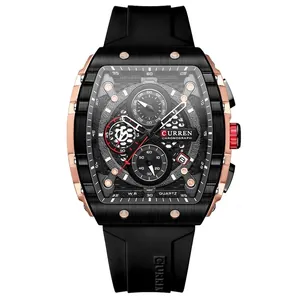 Black tonneau quartz chronograph watch with rose gold accents and honeycomb dial pattern