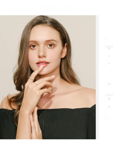 Minimalist 925 sterling silver rings in gold and silver finish on a female model