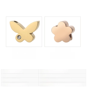 Macro view of crystal-encrusted butterfly and flower charms with detailed size chart