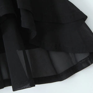 Sexy black chiffon slip dress with tiered ruffle hem and sheer mesh fabric details