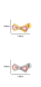 Detail of bow-shaped stud earrings with pink drop gems and size measurements