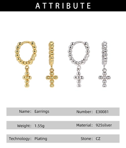 Detail view of S925 sterling silver hoop earrings with beads and hanging cross charms