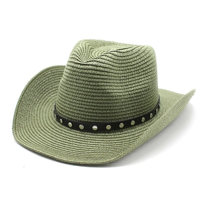 Detail of olive green cowboy straw hat featuring black leather band with silver rivets