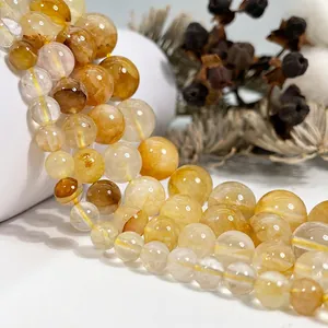 Multiple strands of natural yellow crystal round beads for DIY jewelry making