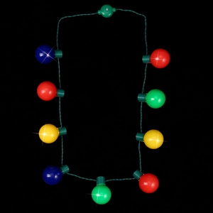 Close-up of glowing 9-LED Christmas bulb necklace with colorful lights on black background