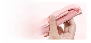 Detail showing the 18cm compact folded length of this pink portable selfie stick tripod