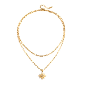 Collana dorata a due strati con catena a graffetta e ciondolo a sole con strass