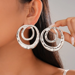 Double-layered silver round hoop earrings with hammered metal texture for women