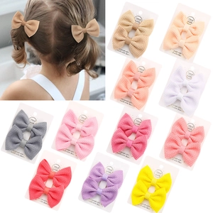 Set of colorful children's textured fabric bow hair clips for girls' styling
