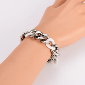 Hip-hop chain bracelet featuring silver-tone metal and white ceramic links on a wrist