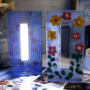 Detailed view of DIY trapezoid epoxy resin night light molds with floral patterns