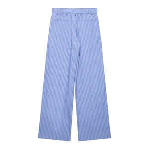 Detailed back view of blue striped wide-leg pants showing elastic waist and buttoned pockets