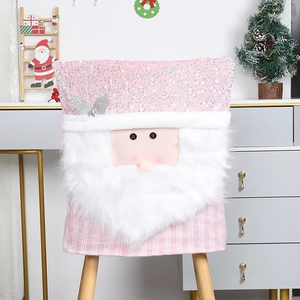 Detailed close-up of a pink sequin Santa chair cover with faux fur and checkered patterns