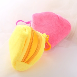 Mini plush triangle coin purses in pink and yellow with zippers and hooks on soft fabric
