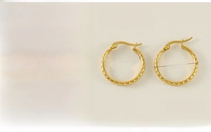 Detail showing 23mm stainless steel 18K gold plated hoop earrings dimensions and weight