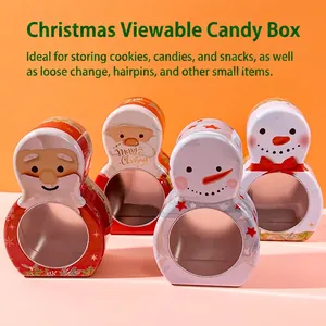 Mini Christmas tin candy boxes with clear windows featuring Santa and snowman designs