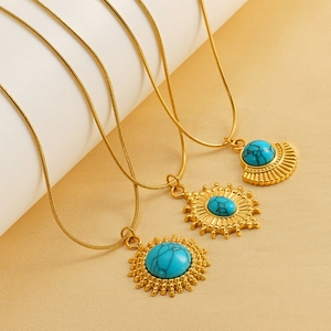Collier rétro en turquoise pour femmes, pendentif soleil en acier inoxydable chic.