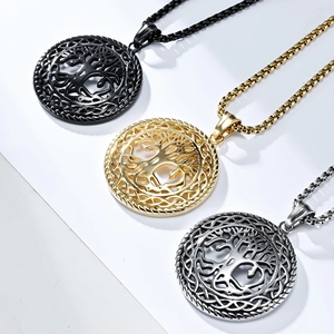 Vintage hollow Tree of Life stainless steel pendants in black, gold, and silver finishes