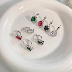 Vintage stainless steel earrings with colorful oval zircon and hollow floral engraving