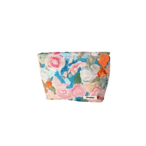 Floral oil painting canvas makeup bag with Sozakka label in artistic Monet style