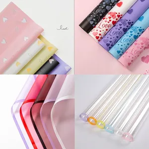 Waterproof floral wrapping paper with neon iridescent finish and heart patterns