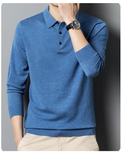 Close-up detail of blue knitted polo sweater featuring fine texture and three-button collar