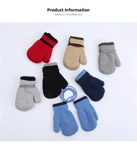 Collection of colorful knitted winter mittens with hanging cords for toddlers and children