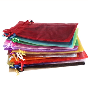 Colorful organza drawstring pouches in various colors for jewelry packaging