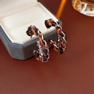 Leopard print fabric woven C-shaped hoop earrings with sparkling zircon accents