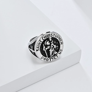 Detail of Saint Christopher signet ring with engraved Saint Christopher Protect Us text