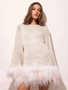 Elegant white sequin mini dress featuring long flare sleeves and luxurious feather hem